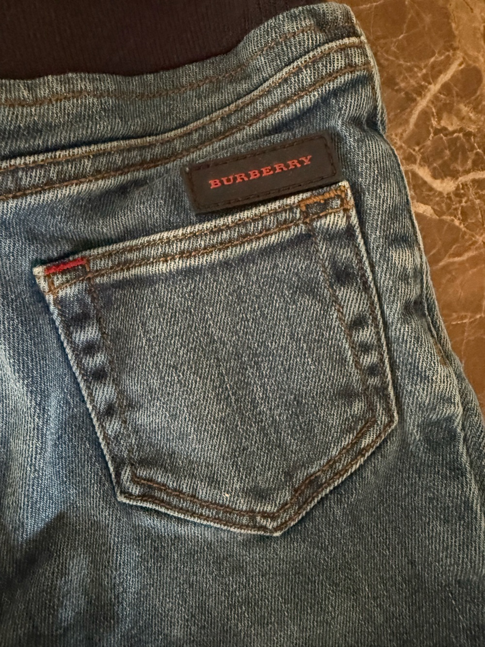 Burberry kids Light Blue Jeans with Branded Leather Tab